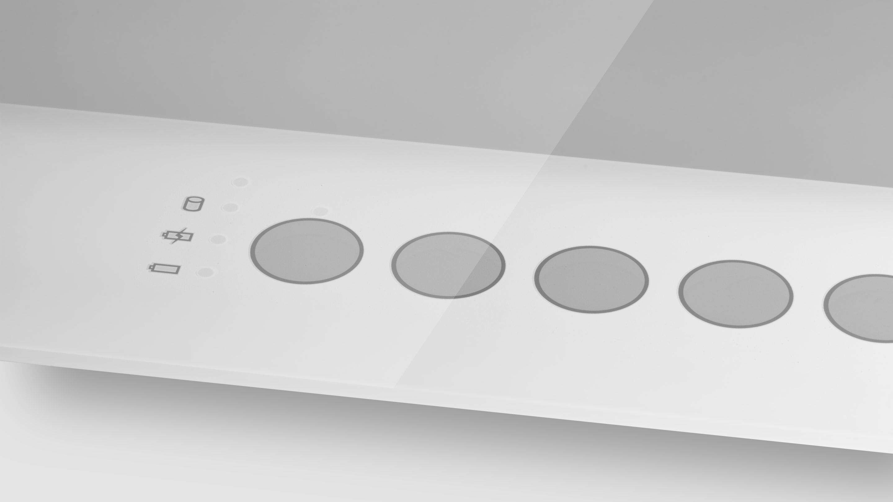 PCAP berøringsskjerm - glasstrykte knapper et hvitt rektangulært objekt med sirkler på